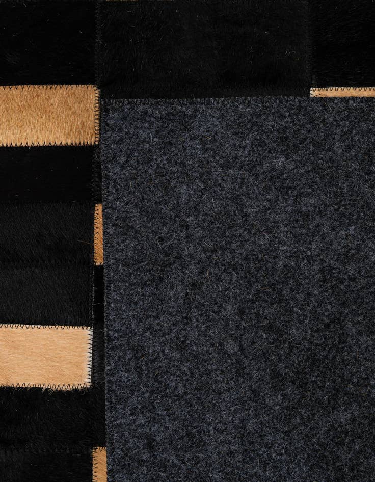 Detail image of  5' 1 x 7' 11 Cowhide - Patchwork Rug