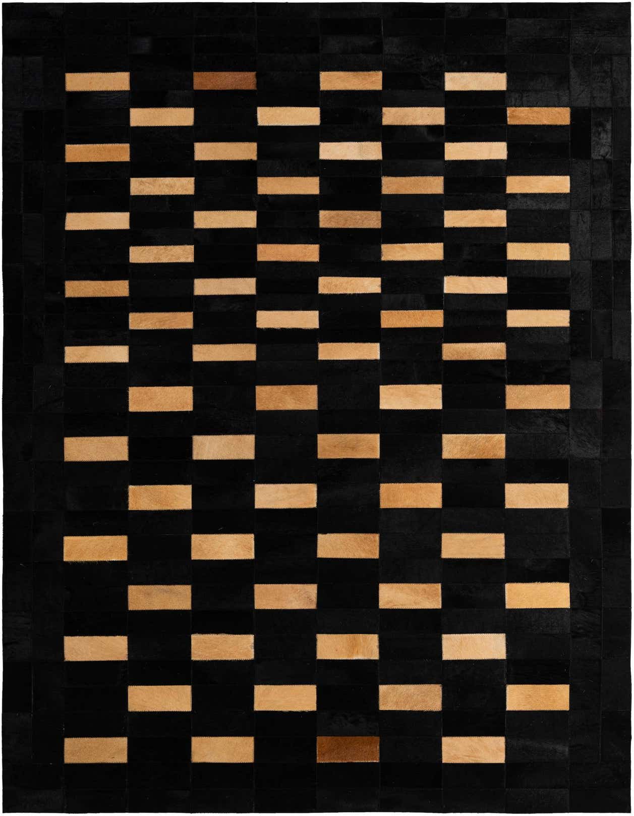 A 5x8 rectangular black cowhide rug with a modern patchwork design of alternating black and natural tan rectangular patches.
