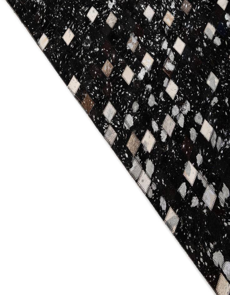 Detail image of  5' x 7' 11 Cowhide - Patchwork Rug