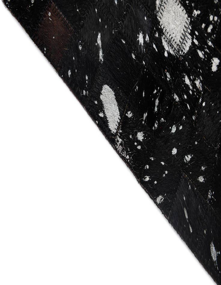 Detail image of  4' 11 x 7' 11 Cowhide - Patchwork Rug