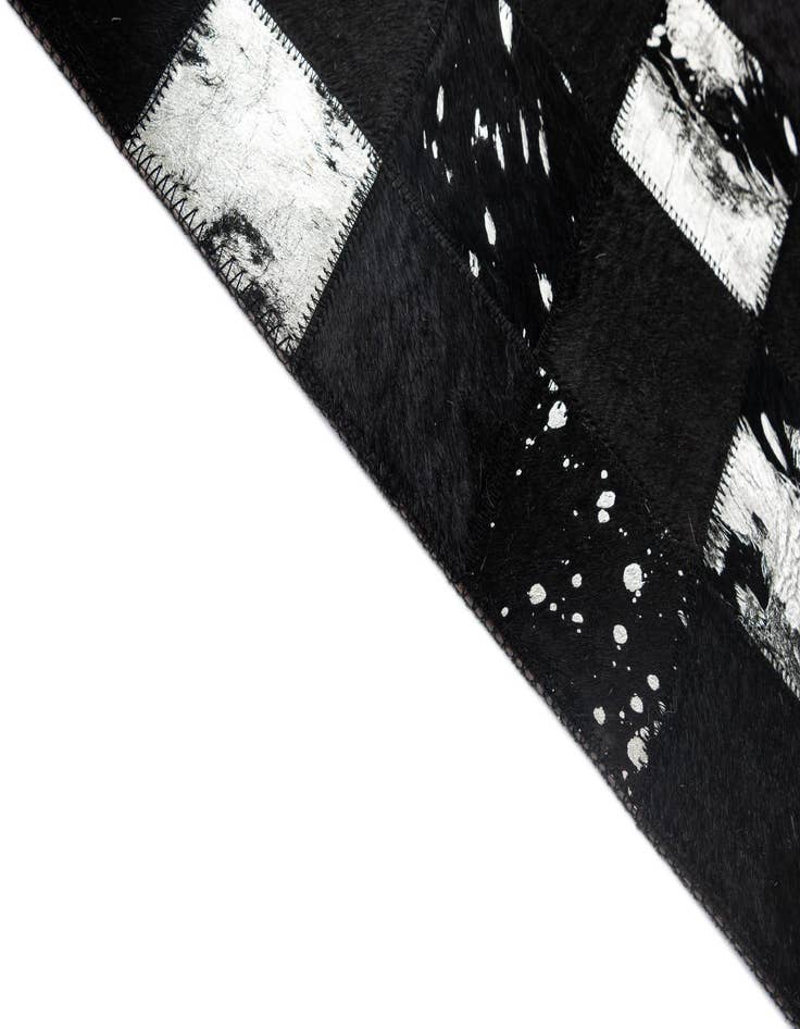 Detail image of  5' x 7' 11 Cowhide - Patchwork Rug