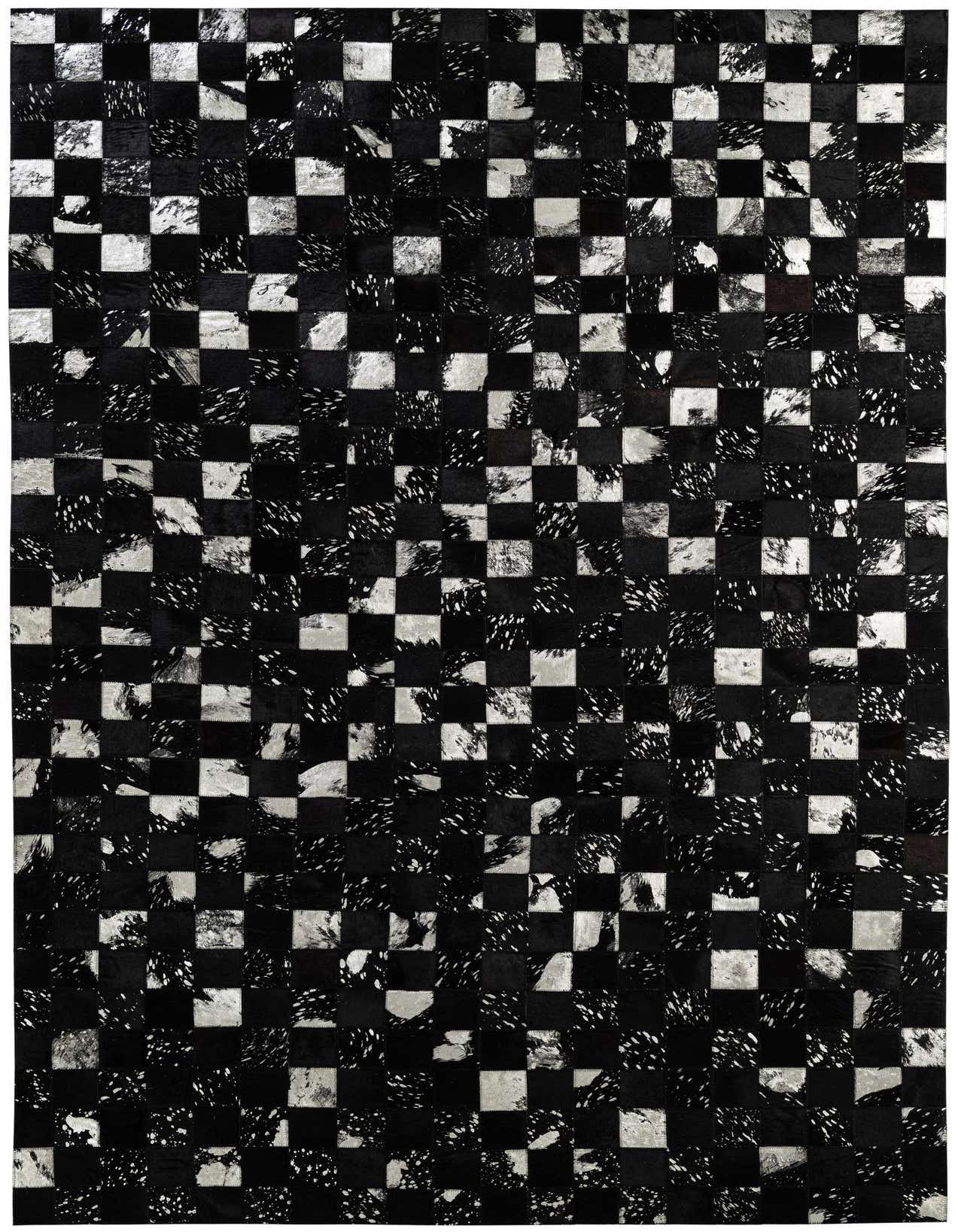 A 5x8 rectangular Cowhide - Patchwork rug featuring a modern checkerboard pattern in black and white tones.