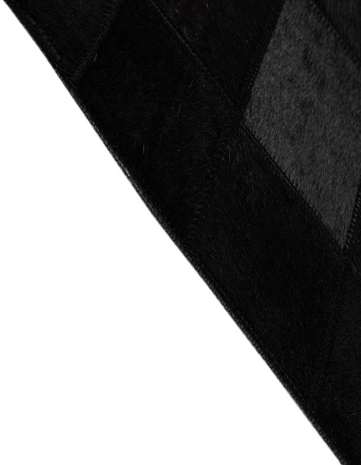 Detail image of  5' 3 x 8' 2 Cowhide - Patchwork Rug