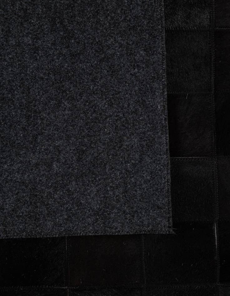 Detail image of  5' 3 x 8' 2 Cowhide - Patchwork Rug