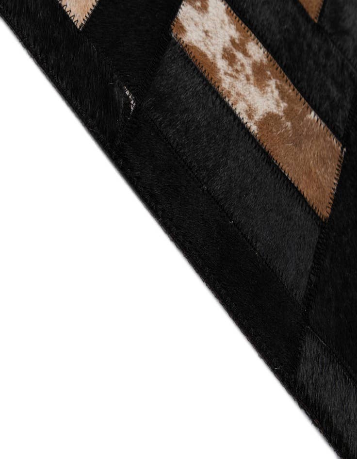 Detail image of  5' 3 x 8' 1 Cowhide - Patchwork Rug