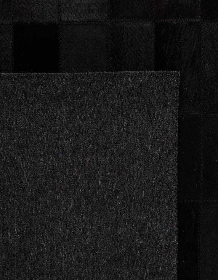 Detail image of  5' 2 x 8' Cowhide - Patchwork Rug