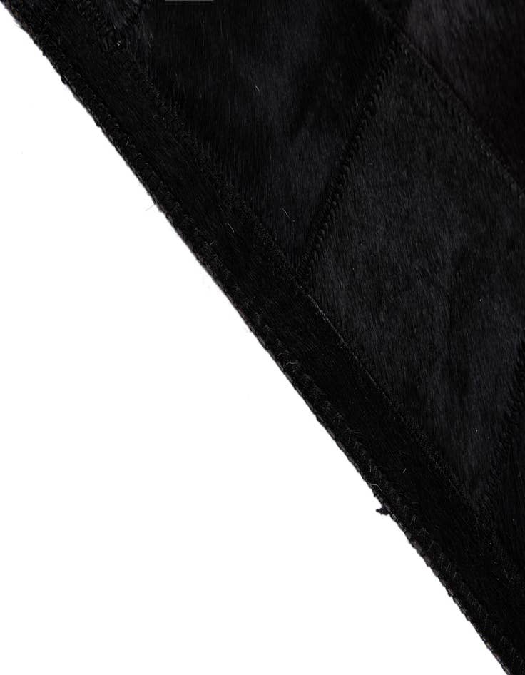 Detail image of  5' 2 x 8' 1 Cowhide - Patchwork Rug