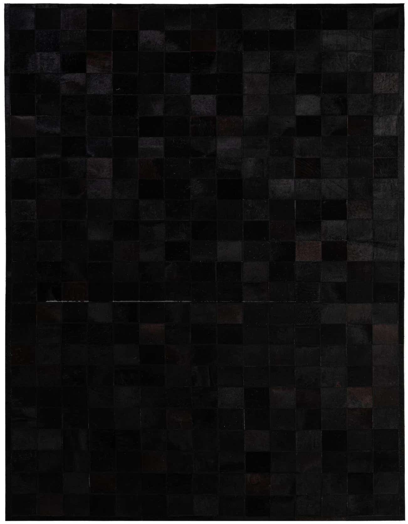 A 5x8 rectangular black cowhide patchwork rug with a modern design, suitable for various indoor rooms.