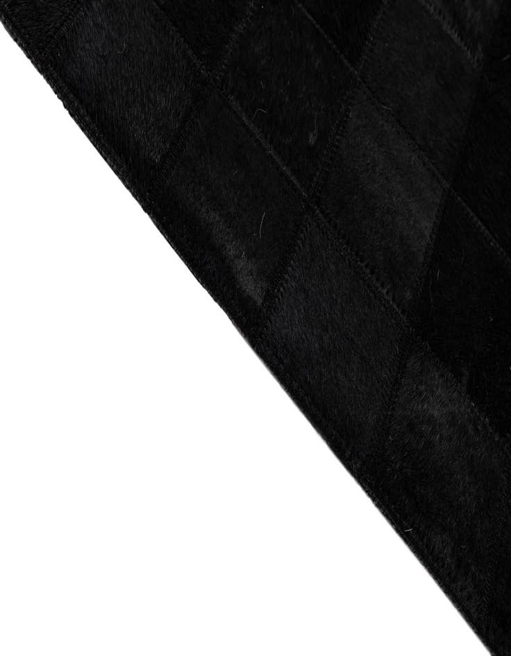 Detail image of  5' 3 x 8' 2 Cowhide - Patchwork Rug