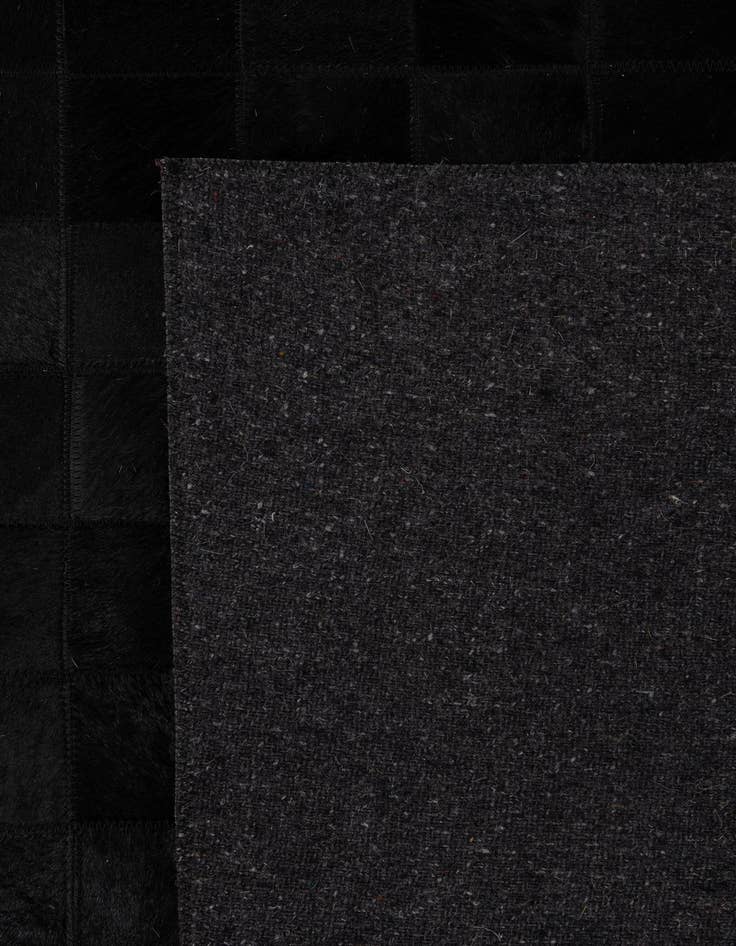 Detail image of  5' 3 x 8' 2 Cowhide - Patchwork Rug