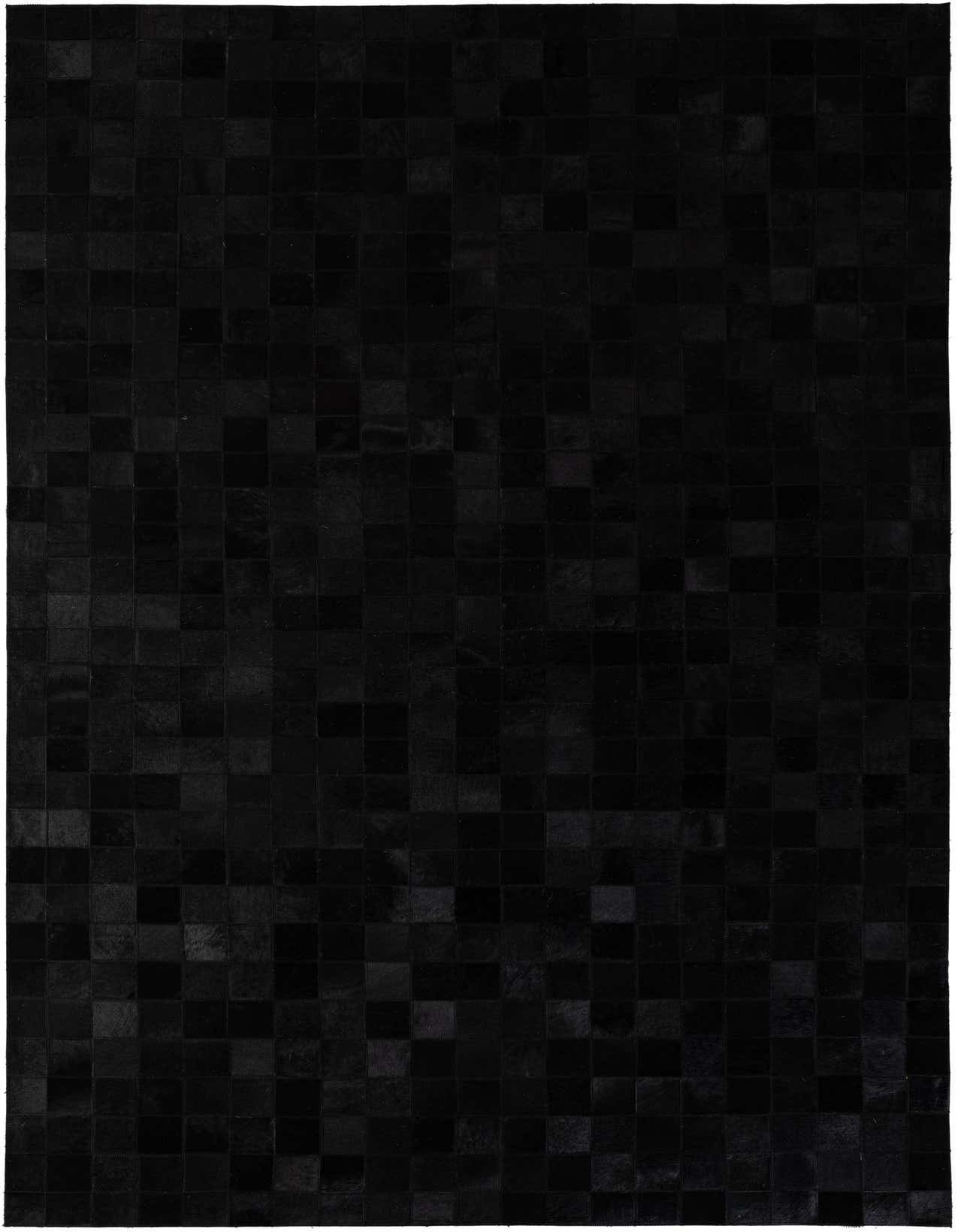 A 5x8 rectangular black modern area rug made from patchwork cowhide and leather, ideal for a living room.