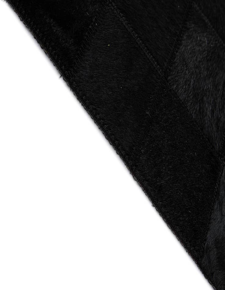 Detail image of  5' 3 x 8' 2 Cowhide - Patchwork Rug