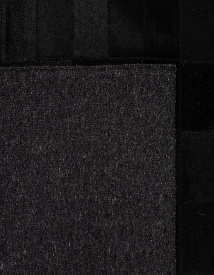 Detail image of  5' 3 x 8' 2 Cowhide - Patchwork Rug