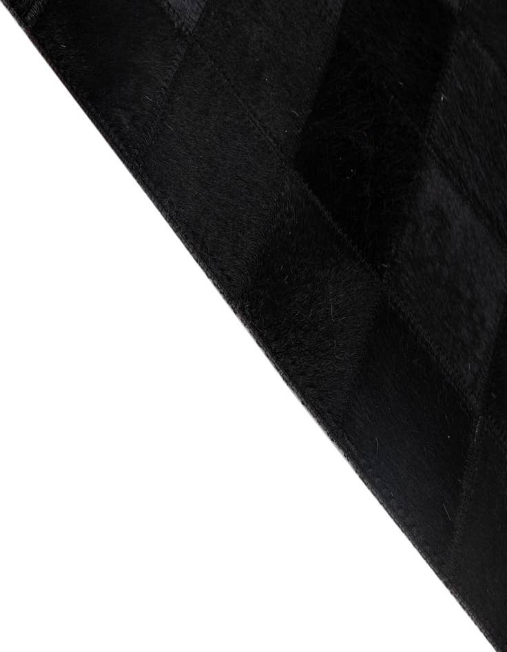 Detail image of  5' 3 x 8' 2 Cowhide - Patchwork Rug