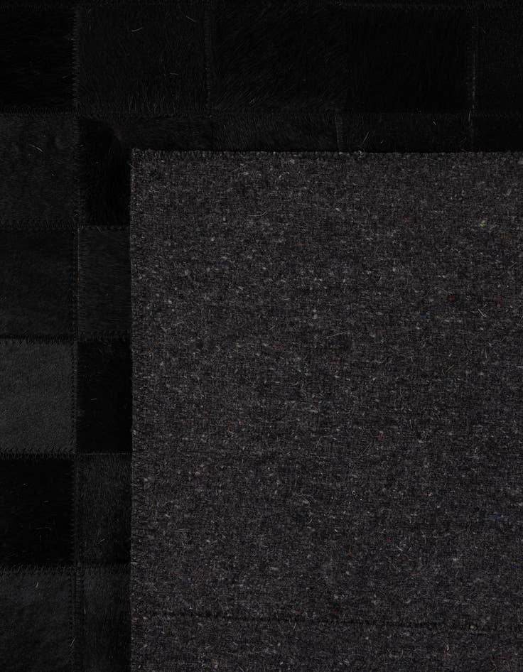 Detail image of  5' 3 x 8' 2 Cowhide - Patchwork Rug