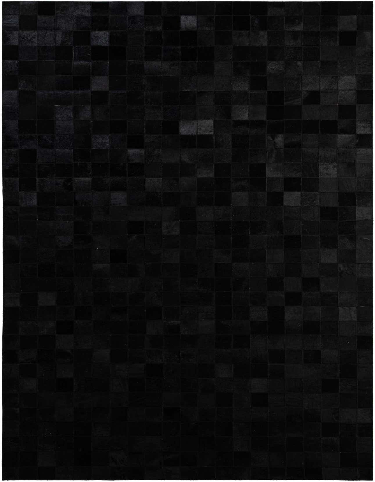 A 5x8 rectangular black modern cowhide patchwork rug, handmade with varying shades of black leather squares.