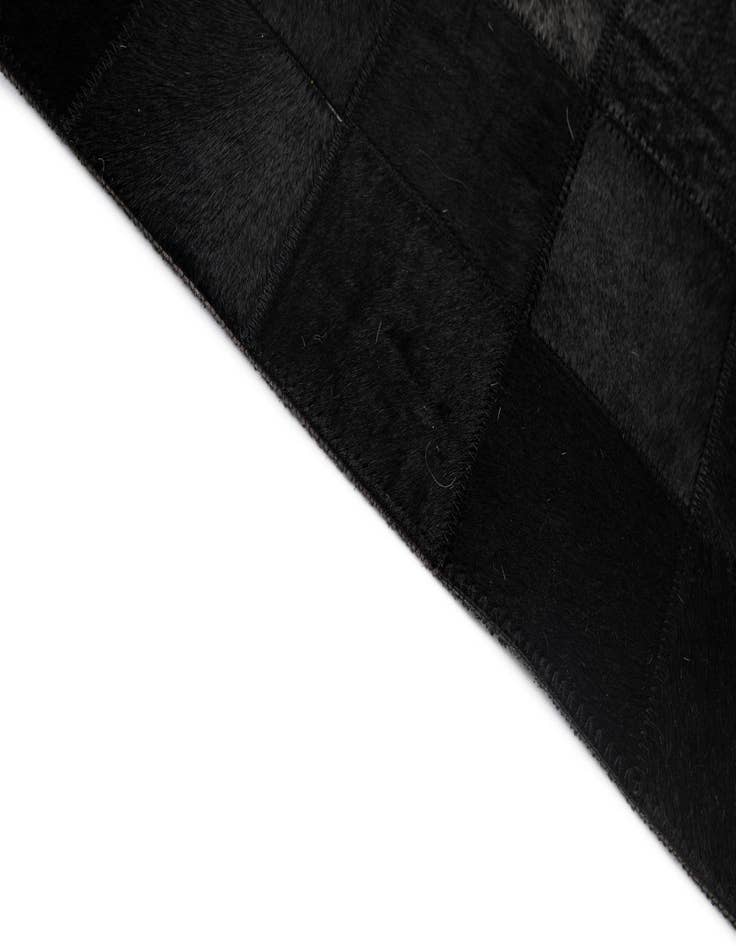 Detail image of  5' 3 x 8' 2 Cowhide - Patchwork Rug