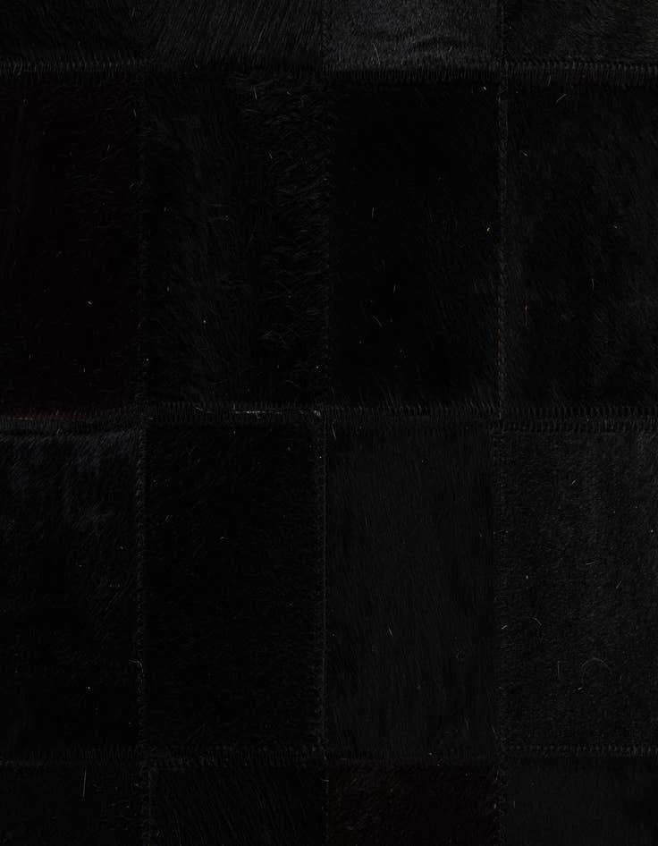 Detail image of  5' 3 x 8' 2 Cowhide - Patchwork Rug