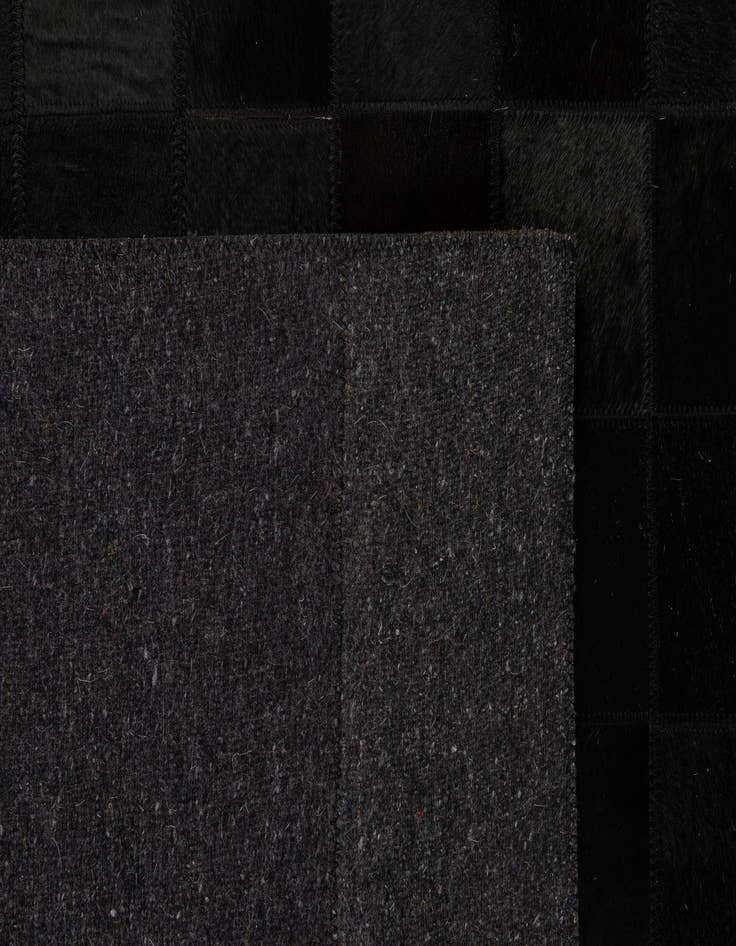 Detail image of  5' 3 x 8' 2 Cowhide - Patchwork Rug