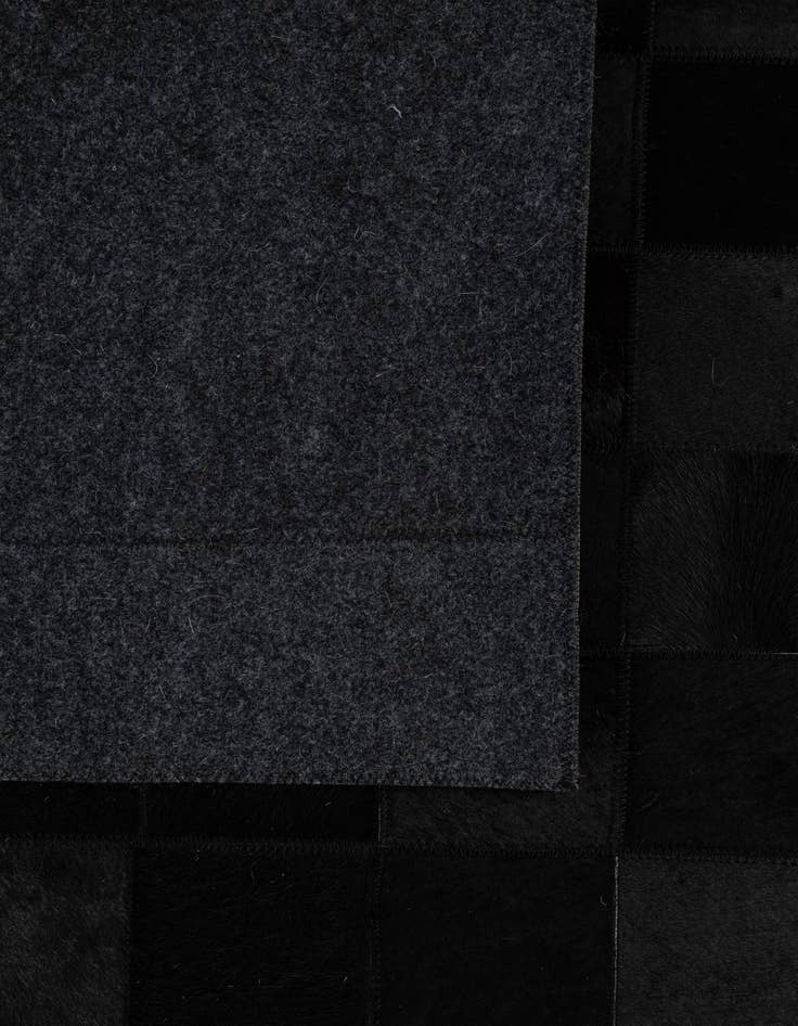 Detail image of  5' 3 x 8' 2 Cowhide - Patchwork Rug