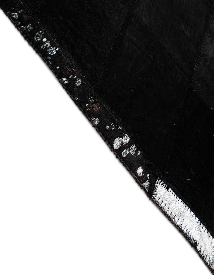 Detail image of  5' 2 x 8' 1 Cowhide - Patchwork Rug