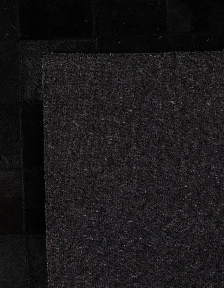 Detail image of  5' 2 x 8' 1 Cowhide - Patchwork Rug