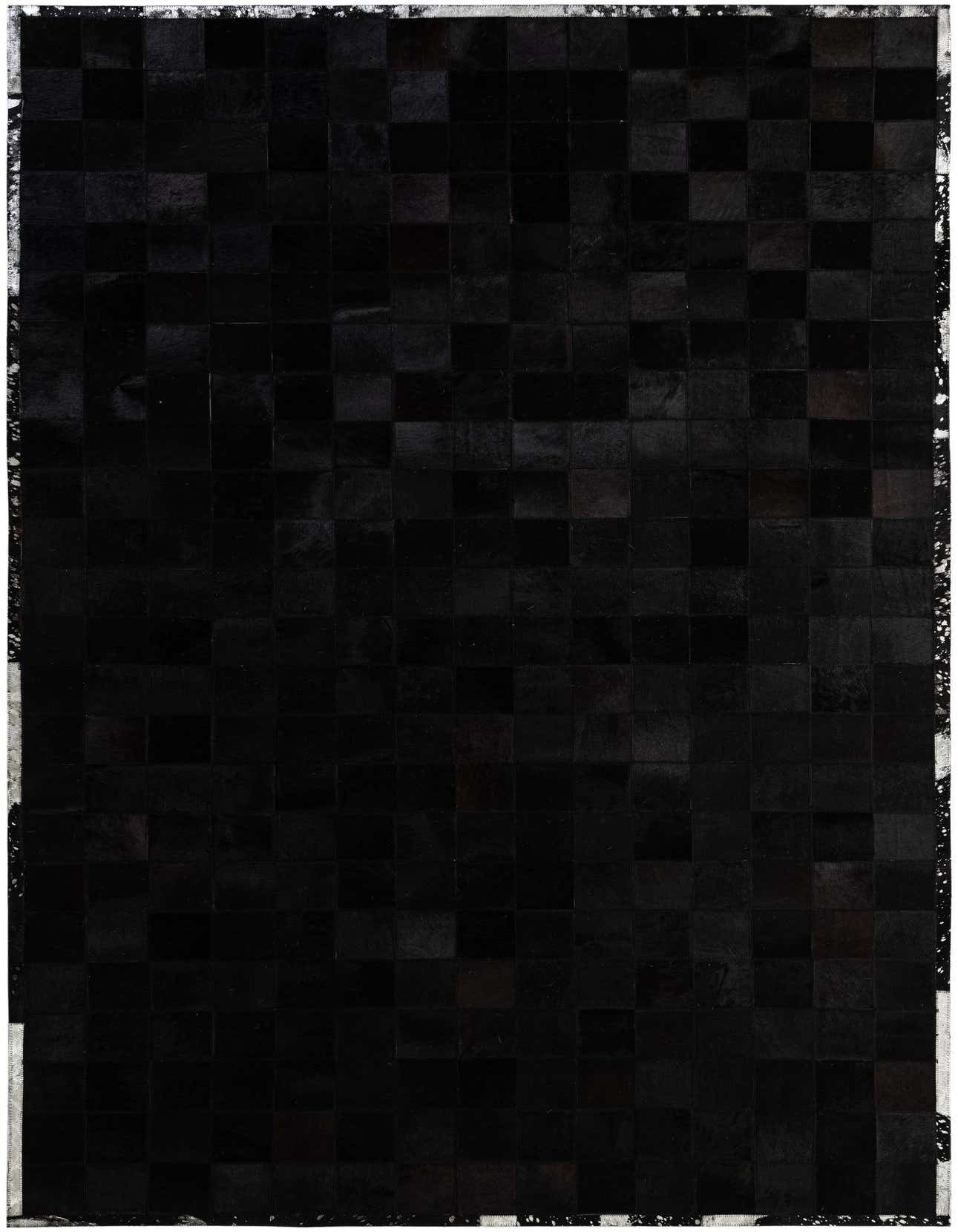 A 5x8 rectangular black modern cowhide patchwork rug with a medium pile, suitable for a living room.