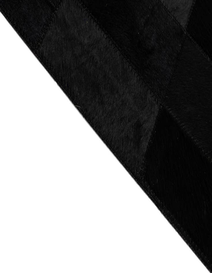 Detail image of  5' 1 x 7' 11 Cowhide - Patchwork Rug