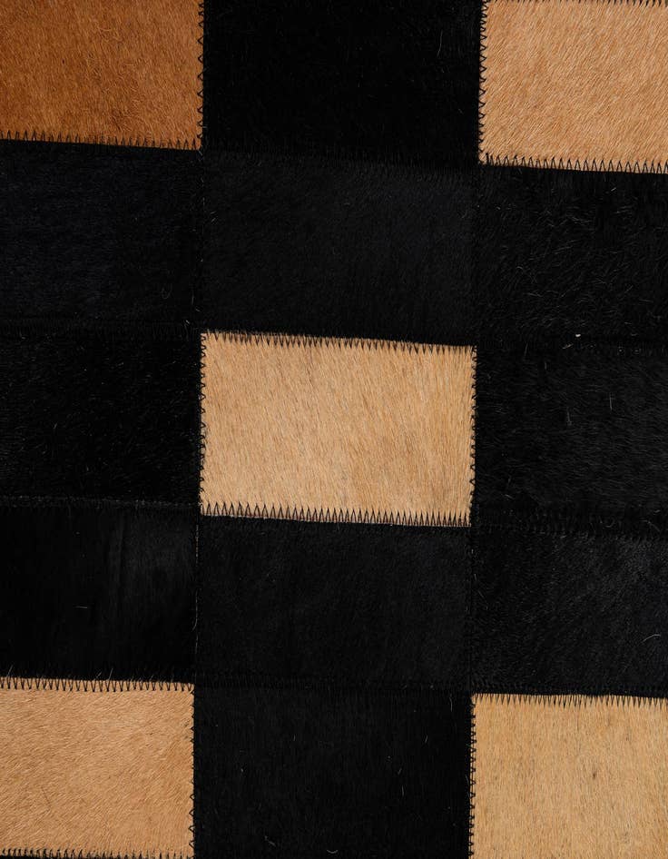 Detail image of  5' 1 x 7' 11 Cowhide - Patchwork Rug