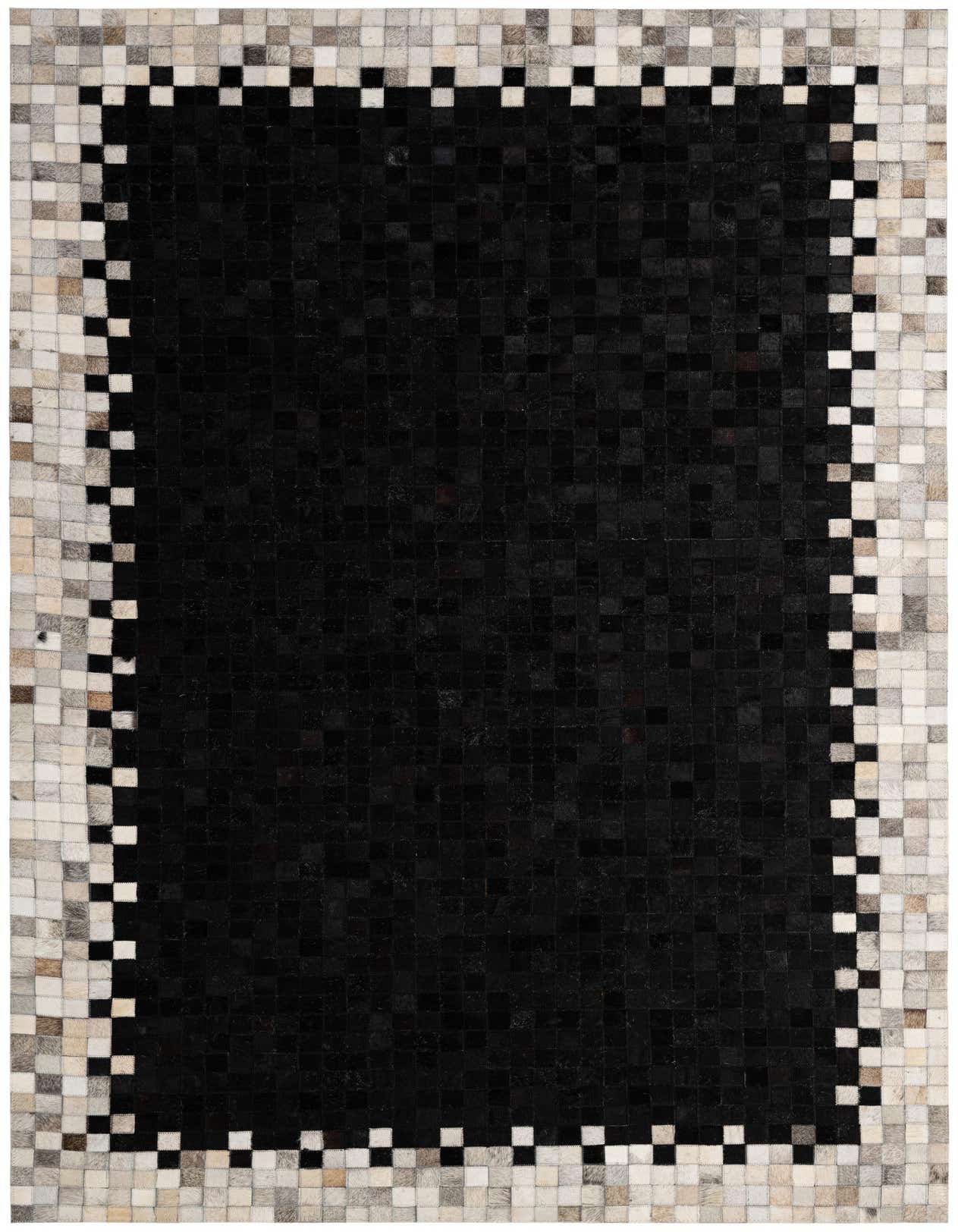 A 5x8 rectangular black cowhide rug with a modern patchwork design and a border of alternating black and white squares.