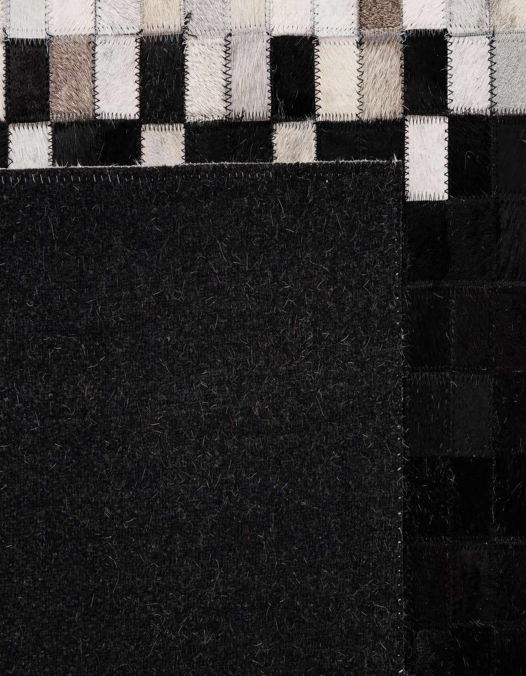 Primary image  5' 2 x 7' 11 Cowhide - Patchwork Rug