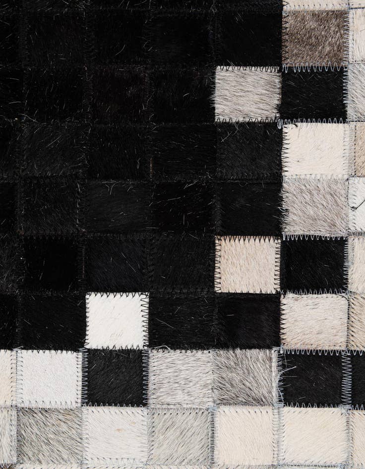 Detail image of  5' 2 x 7' 11 Cowhide - Patchwork Rug
