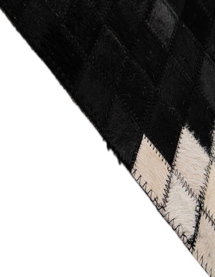 Detail image of  5' 2 x 8' Cowhide - Patchwork Rug