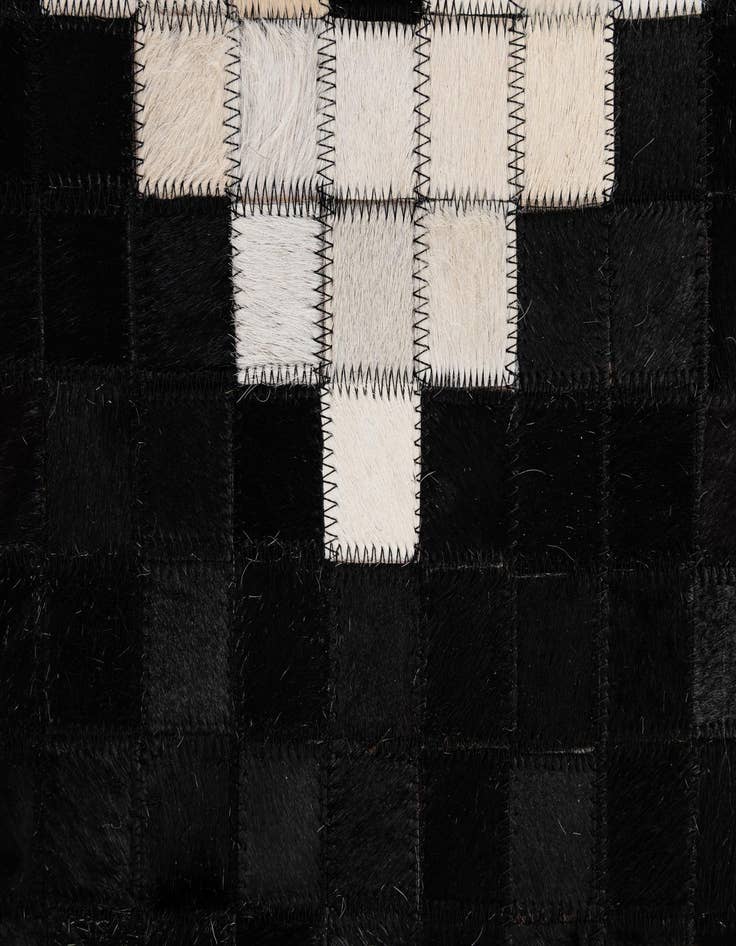 Detail image of  5' 2 x 8' Cowhide - Patchwork Rug