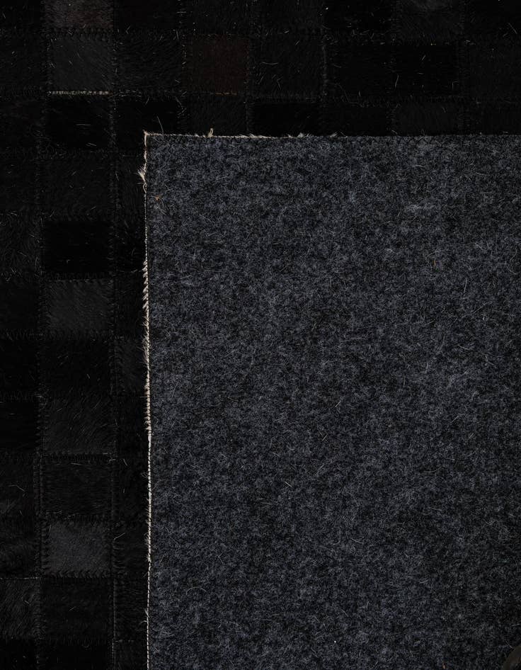 Detail image of  5' 2 x 8' Cowhide - Patchwork Rug