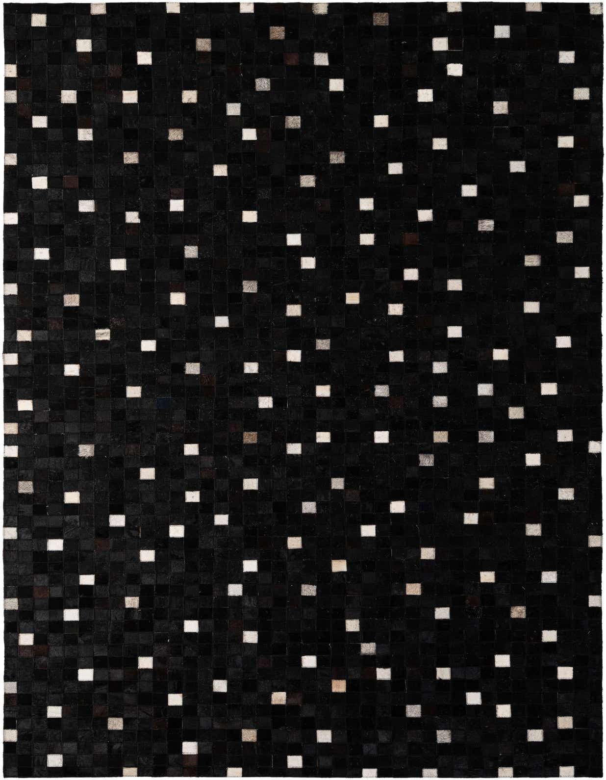 A 5x8 rectangular black cowhide rug with a modern patchwork design, featuring scattered small white and gray squares.