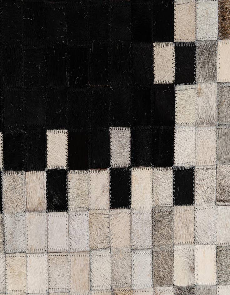 Detail image of  5' 2 x 7' 11 Cowhide - Patchwork Rug