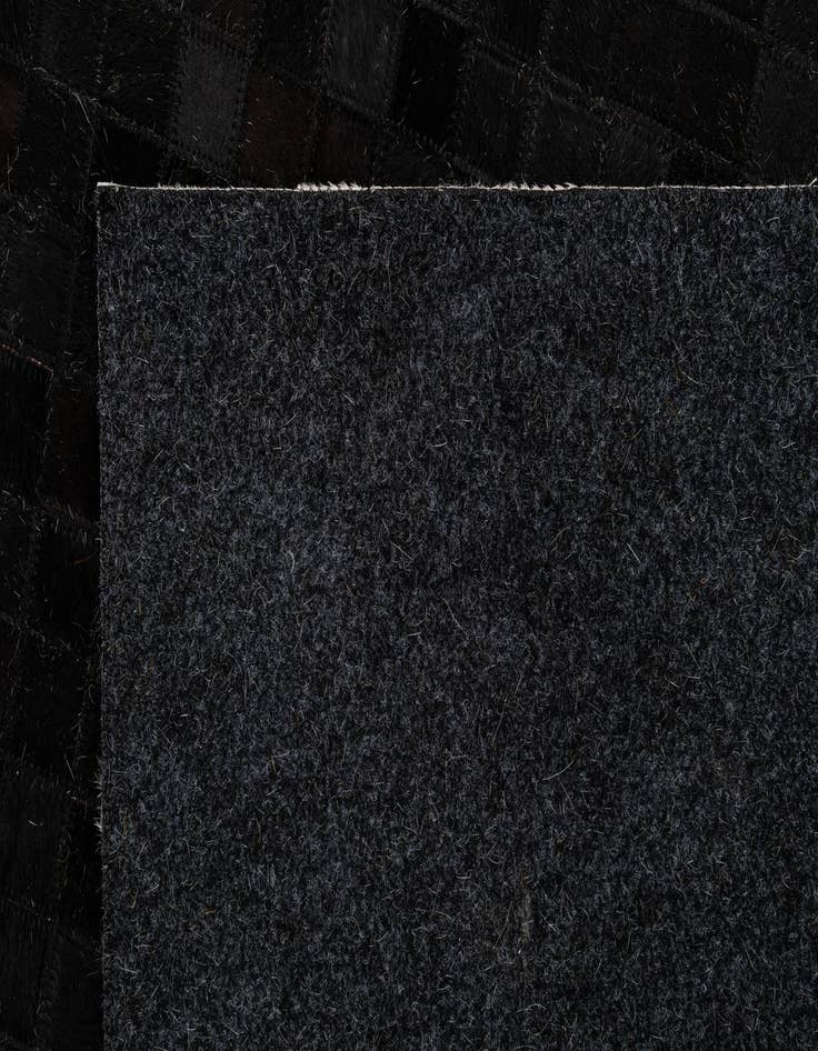 Detail image of  5' 2 x 7' 11 Cowhide - Patchwork Rug