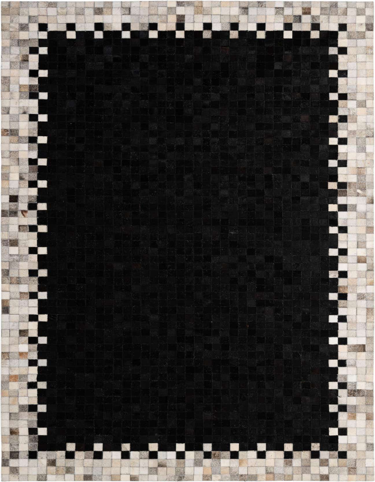 A 5x8 rectangular black cowhide rug with a modern patchwork design and a light checkered border.