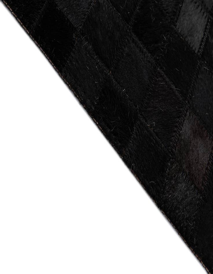 Detail image of  5' 1 x 7' 11 Cowhide - Patchwork Rug