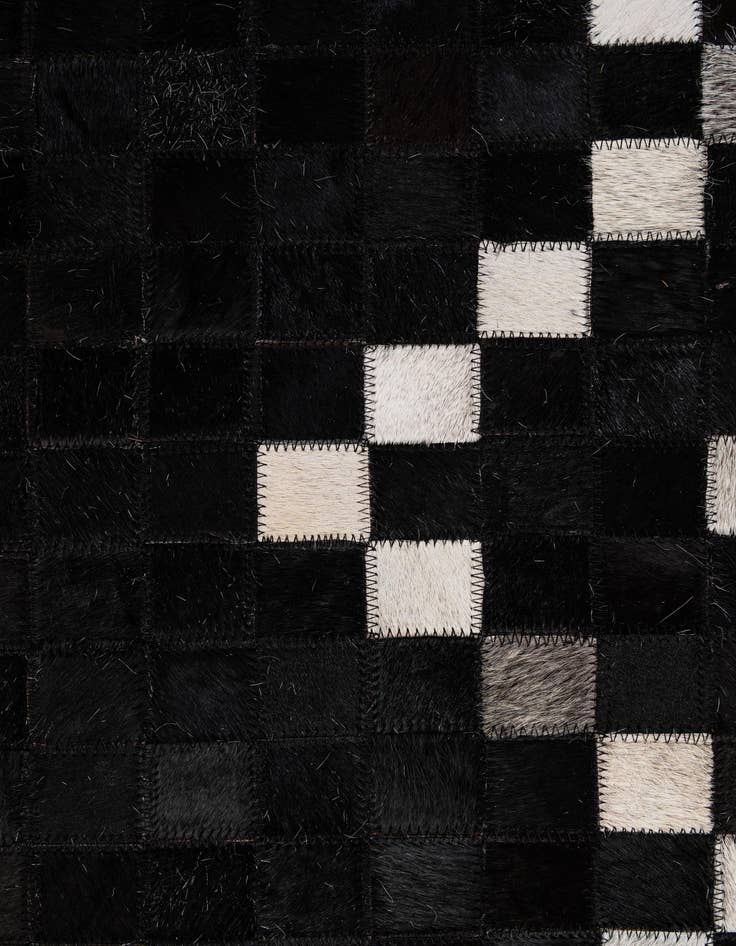 Detail image of  5' 1 x 7' 11 Cowhide - Patchwork Rug