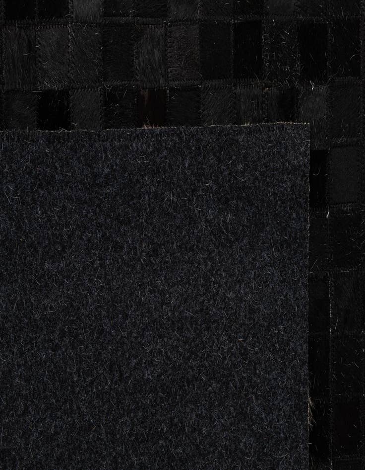 Detail image of  5' 1 x 7' 11 Cowhide - Patchwork Rug