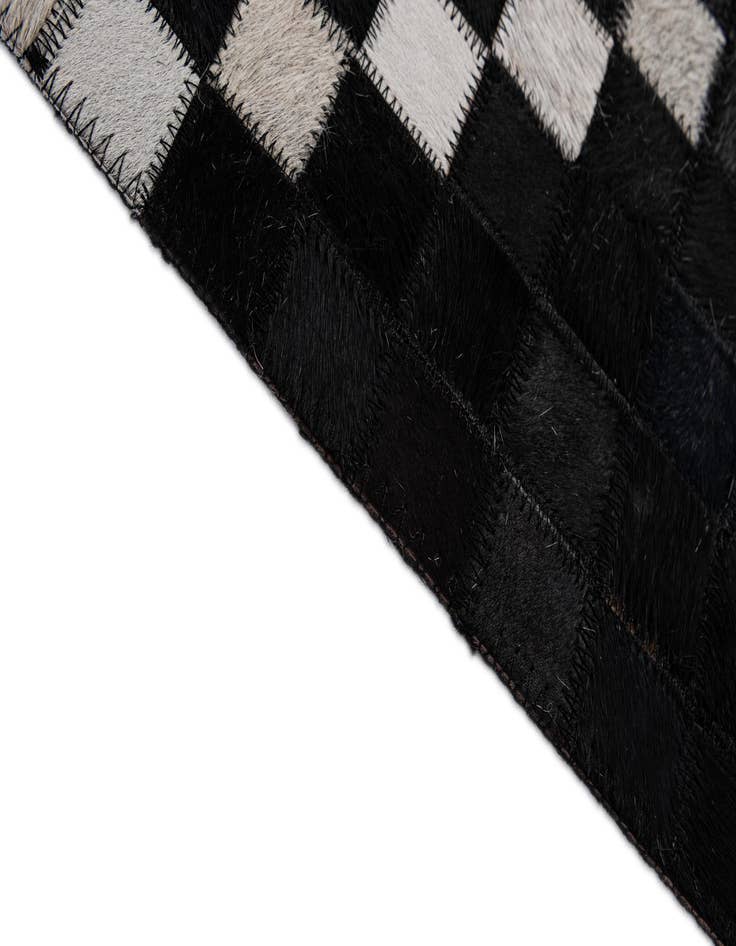 Detail image of  5' x 7' 11 Cowhide - Patchwork Rug