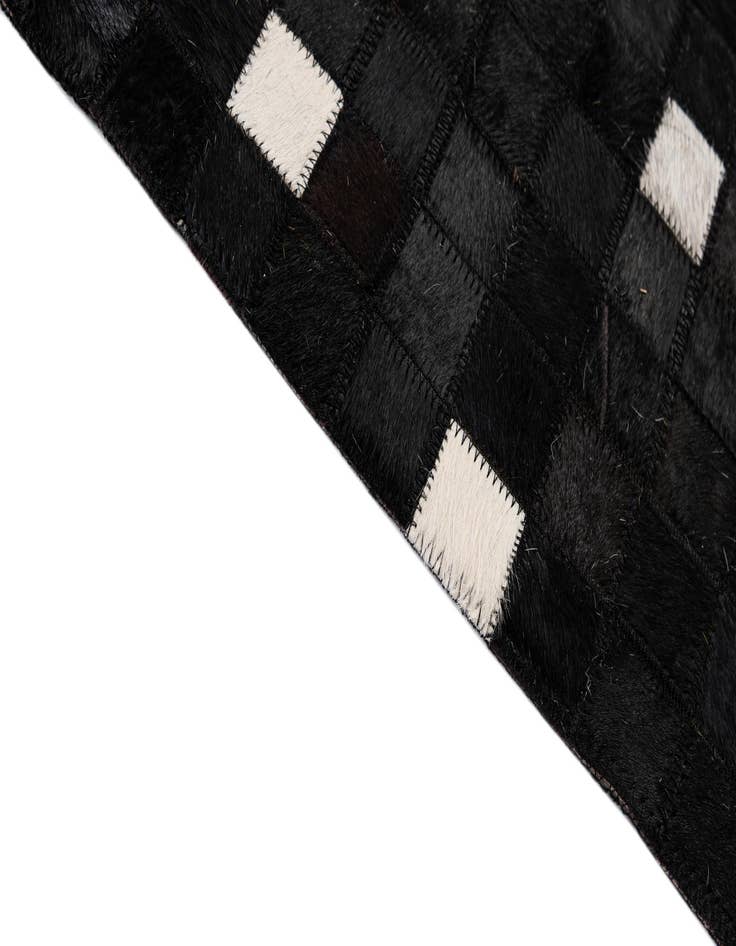 Detail image of  5' 2 x 8' 2 Cowhide - Patchwork Rug