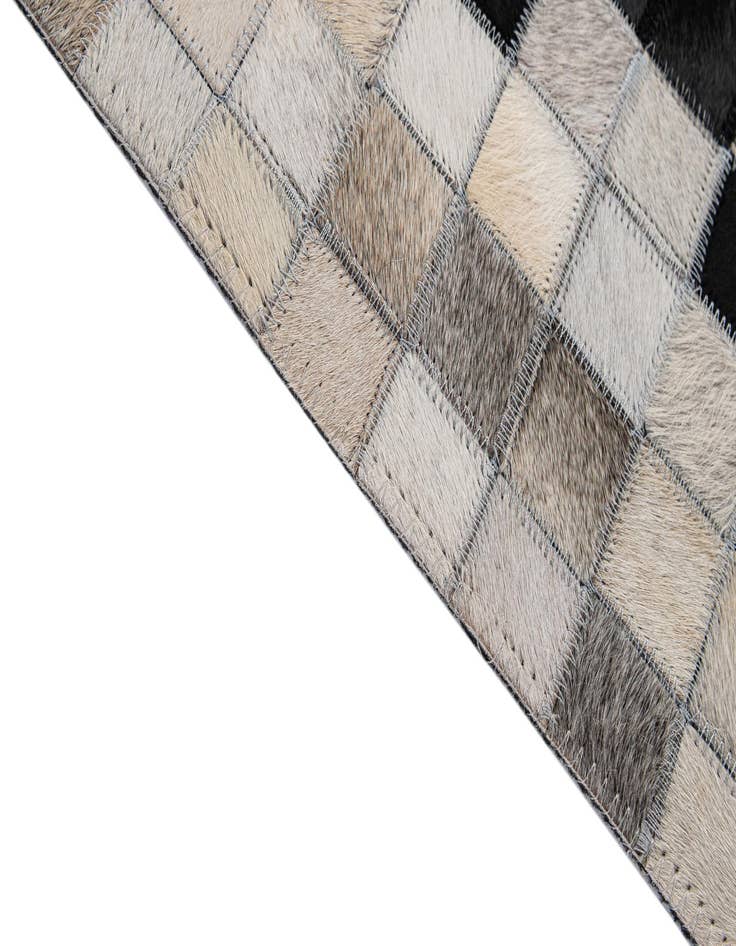 Detail image of  5' 2 x 8' Cowhide - Patchwork Rug