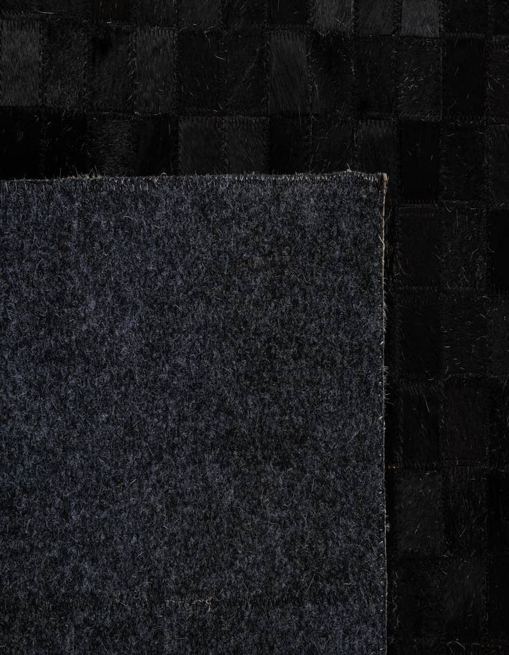 Detail image of  5' 2 x 8' Cowhide - Patchwork Rug