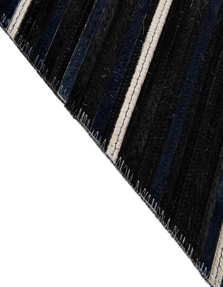 Detail image of  5' 1 x 8' Cowhide - Patchwork Rug