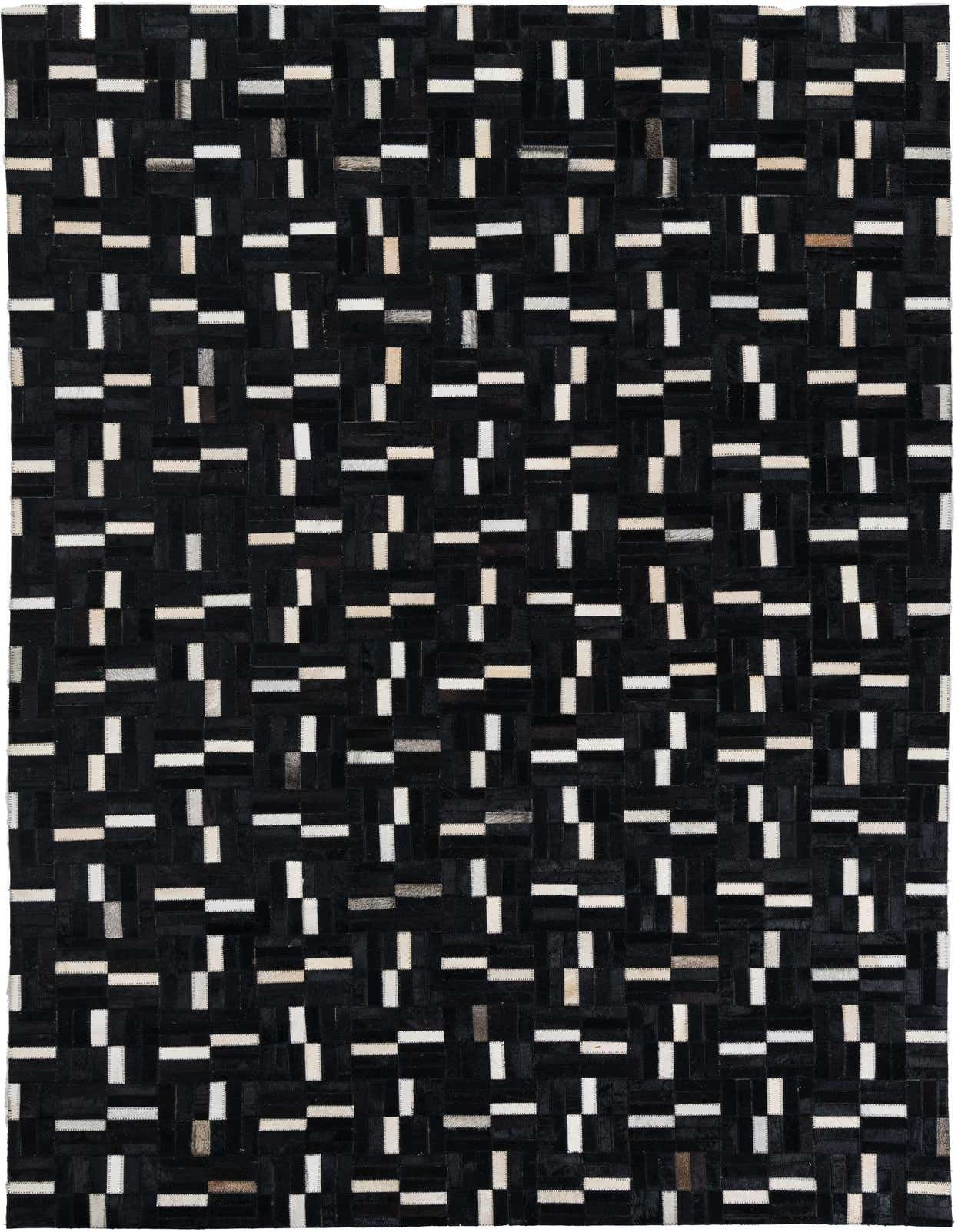 A 5x8 rectangular black cowhide rug with a modern stripe pattern, featuring small white and grey rectangular patches.