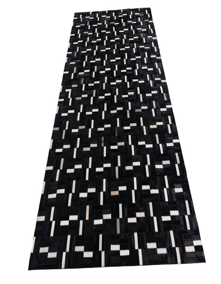 Detail image of  4' 9 x 8' 1 Cowhide Leather Rug