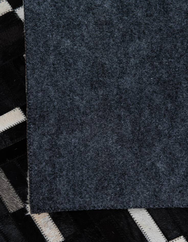 Detail image of  4' 9 x 8' 1 Cowhide Leather Rug